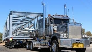 Bridge girder section on an oversize trailer